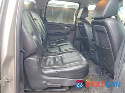 Czwarte zdjęcie samochodu z boku: 2007 CHEVROLET SUBURBAN K1500 VIN:1GNFK16367R318522 - miniatura