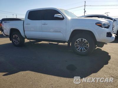 Czwarte zdjęcie samochodu z boku: 2023 TOYOTA TACOMA TRD SPORT VIN:3TMAZ5CNXPM202785 - miniatura