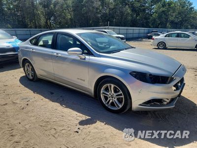 Czwarte zdjęcie samochodu z boku: 2018 FORD FUSION SE HYBRID VIN:3FA6P0LU1JR250083 - miniatura