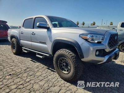 Czwarte zdjęcie samochodu z boku: 2021 TOYOTA TACOMA TRD OFF-ROAD VIN:3TMCZ5AN6MM434615 - miniatura