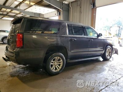 Trzecie zdjęcie samochodu z tyłu: 2015 CHEVROLET SUBURBAN K1500 LT VIN:1GNSKJKCXFR155019 - miniatura