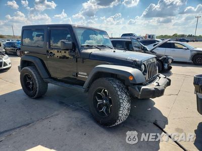 Czwarte zdjęcie samochodu z boku: 2016 JEEP WRANGLER SPORT VIN:1C4AJWAG9GL339655 - miniatura