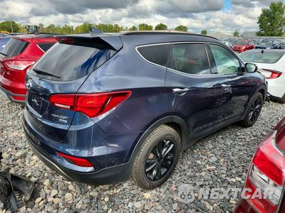 Trzecie zdjęcie samochodu z tyłu: 2017 HYUNDAI SANTA FE SPORT 2.0T VIN:5XYZUDLA0HG402386 - miniatura