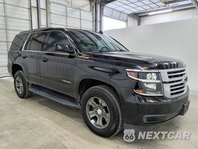 Czwarte zdjęcie samochodu z boku: 2019 CHEVROLET TAHOE C1500 LS VIN:1GNSCAKCXKR220751 - miniatura