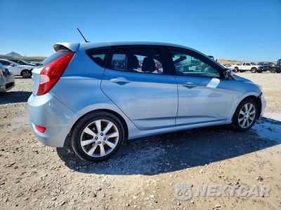 Trzecie zdjęcie samochodu z tyłu: 2012 HYUNDAI ACCENT SE VIN:KMHCU5AE1CU014958 - miniatura