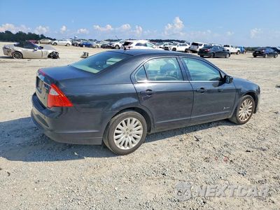 Trzecie zdjęcie samochodu z tyłu: 2010 FORD FUSION HYBRID VIN:3FADP0L32AR171536 - miniatura