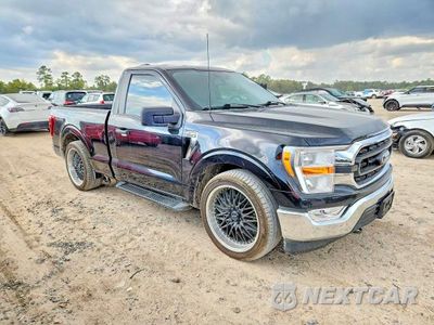 Czwarte zdjęcie samochodu z boku: 2022 FORD F150 VIN:1FTMF1E5XNKE46372 - miniatura