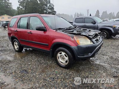 Czwarte zdjęcie samochodu z boku: 2002 HONDA CR-V LX VIN:JHLRD78412C050177 - miniatura
