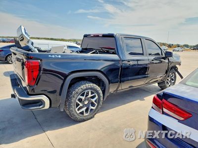 Trzecie zdjęcie samochodu z tyłu: 2023 GMC SIERRA K1500 VIN:3GTPUAEK1PG148263 - miniatura
