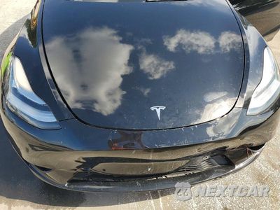 Zdjęcie 12 z 13 samochodu: 2022 TESLA MODEL Y VIN:7SAYGDEE9NF427618 - miniatura