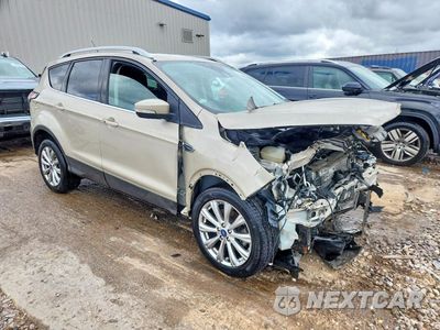 Czwarte zdjęcie samochodu z boku: 2018 FORD ESCAPE TITANIUM VIN:1FMCU9J95JUC48589 - miniatura