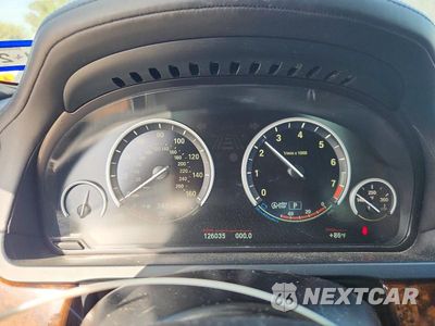 Zdjęcie 9 z 12 samochodu: 2013 BMW 750 LI VIN:WBAYE8C51DD133842 - miniatura