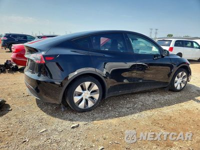 Trzecie zdjęcie samochodu z tyłu: 2023 TESLA MODEL Y VIN:7SAYGDEE7PA186030 - miniatura