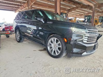 Czwarte zdjęcie samochodu z boku: 2022 CHEVROLET TAHOE C1500 HIGH COUNTRY VIN:1GNSCTKL8NR155527 - miniatura
