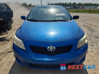 Piąte zdjęcie samochodu w środku: 2010 TOYOTA COROLLA LE VIN:1NXBU4EE5AZ239669 - miniatura