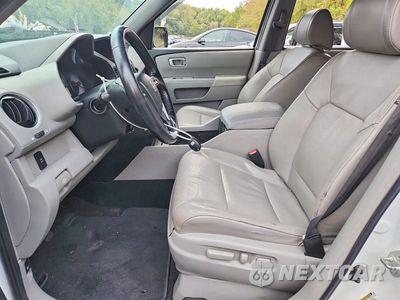 Zdjęcie 7 z 13 samochodu: 2011 HONDA PILOT EXL VIN:5FNYF3H55BB006688 - miniatura