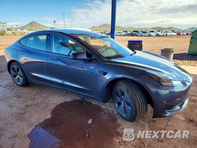Czwarte zdjęcie samochodu z boku: 2022 TESLA MODEL 3 VIN:5YJ3E1EB8NF299390 - miniatura
