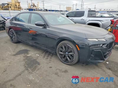 Czwarte zdjęcie samochodu z boku: 2024 BMW 740 I VIN:WBA23EH00RCT04472 - miniatura