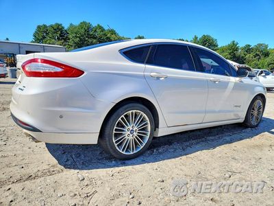 Trzecie zdjęcie samochodu z tyłu: 2013 FORD FUSION SE HYBRID VIN:3FA6P0LU3DR266838 - miniatura
