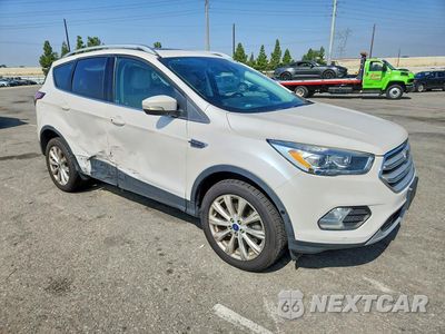 Czwarte zdjęcie samochodu z boku: 2018 FORD ESCAPE TITANIUM VIN:1FMCU9J9XJUA24668 - miniatura