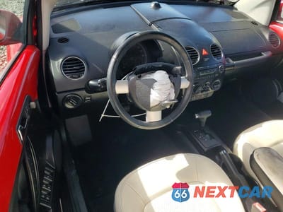 Zdjęcie 8 z 13 samochodu: 2010 VOLKSWAGEN NEW BEETLE VIN:3VWRG3ALXAM008308 - miniatura