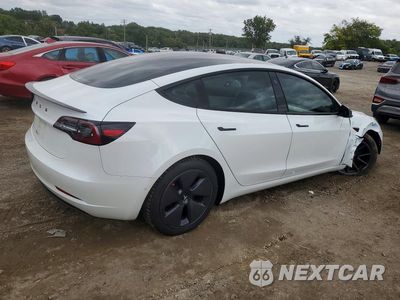 Trzecie zdjęcie samochodu z tyłu: 2021 TESLA MODEL 3 VIN:5YJ3E1EA8MF915823 - miniatura