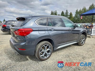 Trzecie zdjęcie samochodu z tyłu: 2017 BMW X1 XDRIVE28I VIN:WBXHT3C34H5F83209 - miniatura