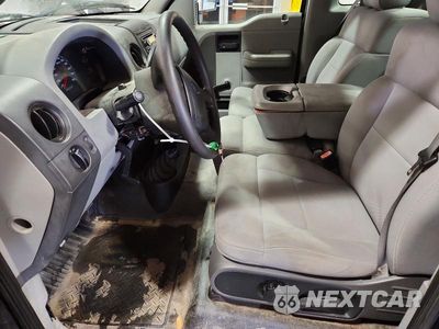 Zdjęcie 7 z 12 samochodu: 2004 FORD F150 VIN:1FTVF14554NB81167 - miniatura