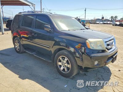 Czwarte zdjęcie samochodu z boku: 2011 HONDA PILOT TOURING VIN:5FNYF3H97BB049688 - miniatura