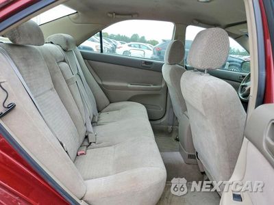 Zdjęcie 10 z 12 samochodu: 2002 TOYOTA CAMRY LE VIN:JTDBE32K620079588 - miniatura