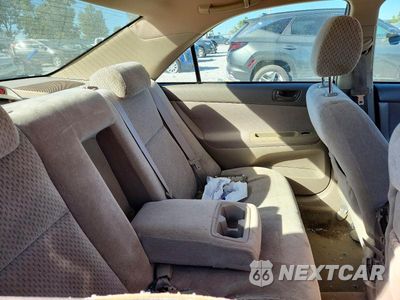 Zdjęcie 10 z 12 samochodu: 2004 TOYOTA CAMRY LE VIN:4T1BE32K24U851303 - miniatura