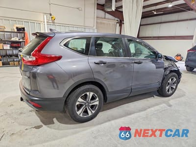 Trzecie zdjęcie samochodu z tyłu: 2019 HONDA CR-V LX VIN:2HKRW6H30KH226861 - miniatura