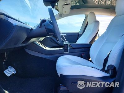 Zdjęcie 7 z 12 samochodu: 2023 TESLA MODEL Y VIN:7SAYGDEF8PF812681 - miniatura