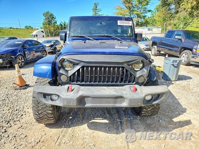 Piąte zdjęcie samochodu w środku: 2013 JEEP WRANGLER UNLIMITED SAHARA VIN:1C4BJWEG4DL608607 - miniatura