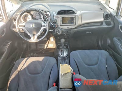 Zdjęcie 8 z 12 samochodu: 2009 HONDA FIT SPORT VIN:JHMGE88699S037538 - miniatura
