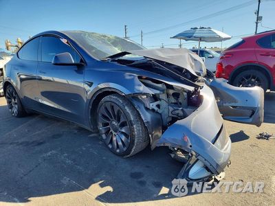 Czwarte zdjęcie samochodu z boku: 2022 TESLA MODEL Y VIN:7SAYGDEF7NF531811 - miniatura