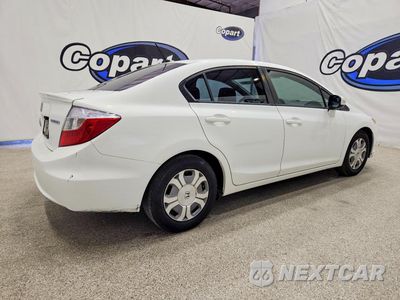 Trzecie zdjęcie samochodu z tyłu: 2012 HONDA CIVIC HYBRID VIN:JHMFB4F23CS000277 - miniatura