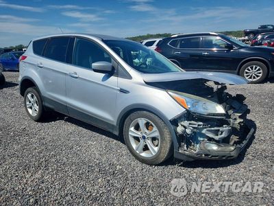 Czwarte zdjęcie samochodu z boku: 2015 FORD ESCAPE SE VIN:1FMCU0G73FUC41083 - miniatura