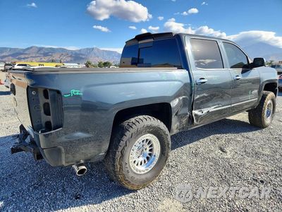 Trzecie zdjęcie samochodu z tyłu: 2017 CHEVROLET SILVERADO C1500 HIGH COUNTRY VIN:3GCPCTEC1HG275023 - miniatura