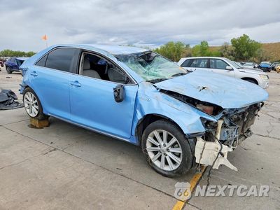 Czwarte zdjęcie samochodu z boku: 2012 TOYOTA CAMRY HYBRID XLE VIN:4T1BD1FKXCU061506 - miniatura