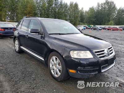 Czwarte zdjęcie samochodu z boku: 2006 VOLKSWAGEN TOUAREG TDI 5.0 VIN:WVGPT77L76D059879 - miniatura