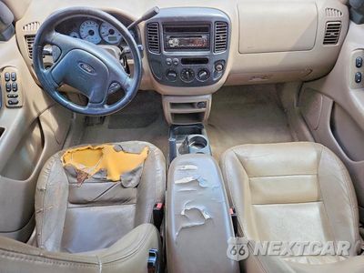 Zdjęcie 8 z 14 samochodu: 2001 FORD ESCAPE XLT VIN:1FMYU03171KA98411 - miniatura