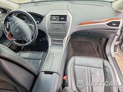Zdjęcie 8 z 12 samochodu: 2016 LINCOLN MKZ HYBRID VIN:3LN6L2LU2GR627509 - miniatura