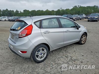 Trzecie zdjęcie samochodu z tyłu: 2018 FORD FIESTA SE VIN:3FADP4EJ5JM117521 - miniatura