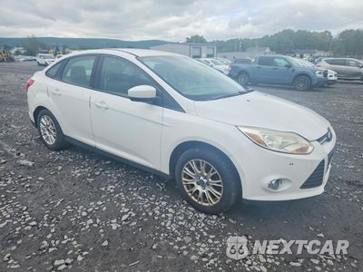 Czwarte zdjęcie samochodu z boku: 2012 FORD FOCUS SE VIN:1FAHP3F29CL132806 - miniatura