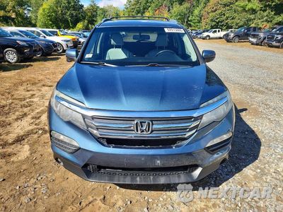 Piąte zdjęcie samochodu w środku: 2017 HONDA PILOT EXL VIN:5FNYF6H57HB086702 - miniatura