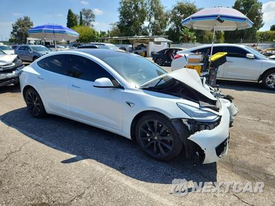 Czwarte zdjęcie samochodu z boku: 2020 TESLA MODEL 3 VIN:5YJ3E1EB1LF667678 - miniatura