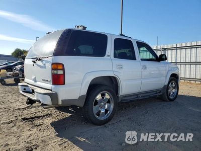 Trzecie zdjęcie samochodu z tyłu: 2003 CHEVROLET TAHOE K1500 VIN:1GNEK13T43R256919 - miniatura