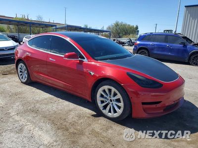 Czwarte zdjęcie samochodu z boku: 2018 TESLA MODEL 3 VIN:5YJ3E1EB1JF093483 - miniatura