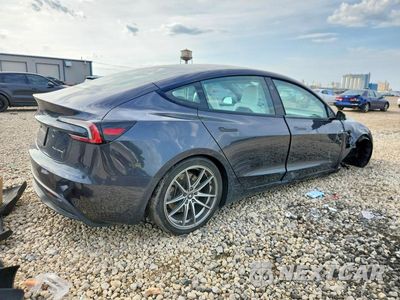 Trzecie zdjęcie samochodu z tyłu: 2024 TESLA MODEL 3 VIN:5YJ3E1EB0RF853835 - miniatura